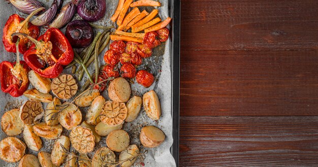 oven-baked vegetables with spices olive oil and fragrant grassmin