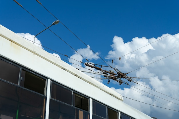 Overhead catenary, part of overhead line equipment of passenger city electric bus. electrification system.