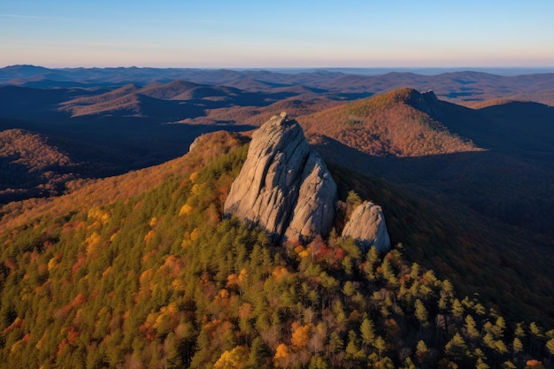 Overhead image of the Carpathian Mountains at sunset with the massive elephant rock in the foregro