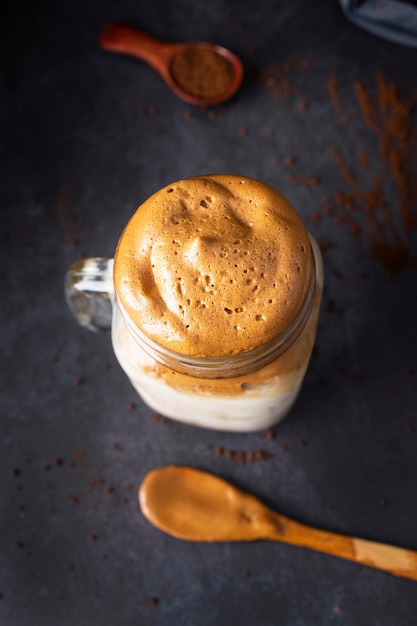 Photo overhead shot of a creamy iced dalgona coffee