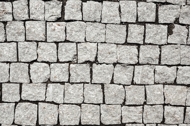 Overhead view of cobblestone street texture. Stone pavement texture. High quality photo