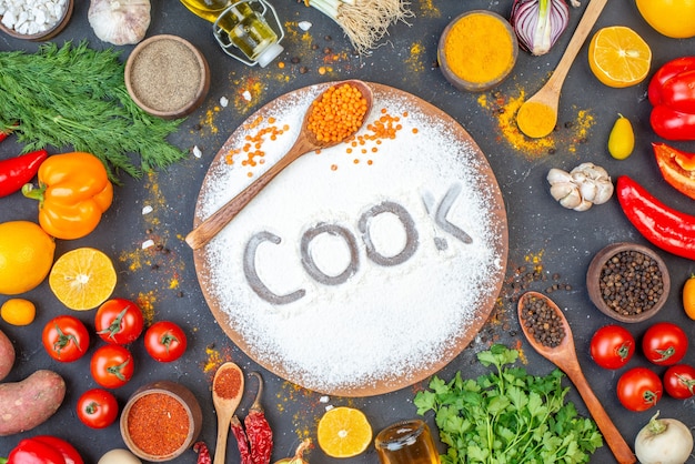 Photo overhead view of cook writing with flour