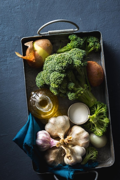 Overhead view raw ingredients for preparation broccoli cream soup