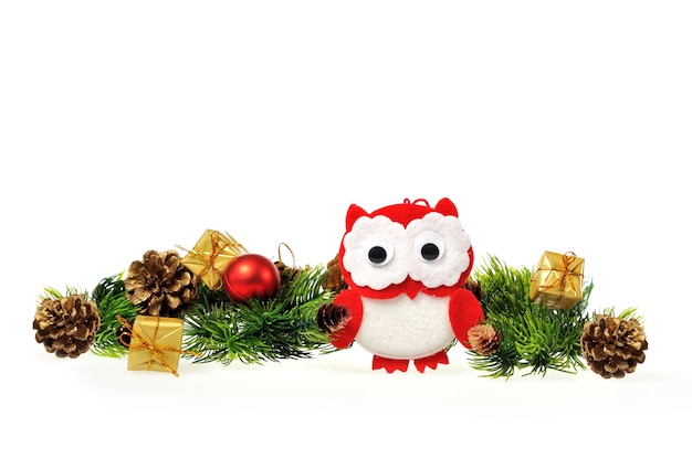 Owl with Christmas tree with gifts and cones.