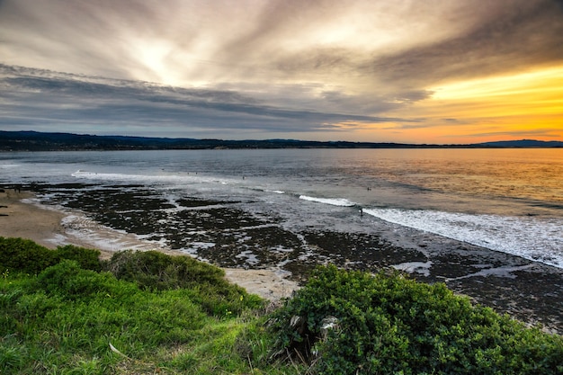 The Pacific Ocean coast in the city of Monterey in California