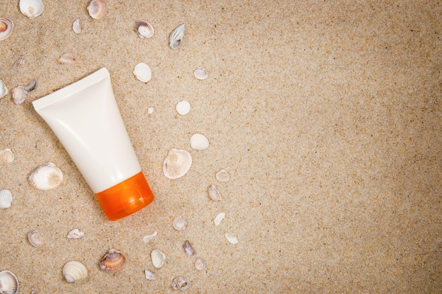 Packaging for cream on the sand with shells free space for your text