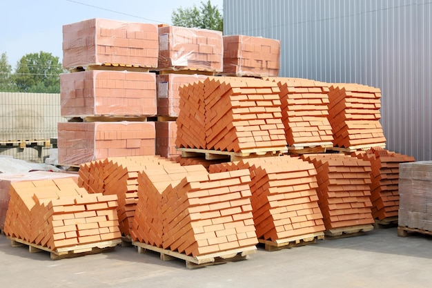 Packaging new construction red brick on pallets