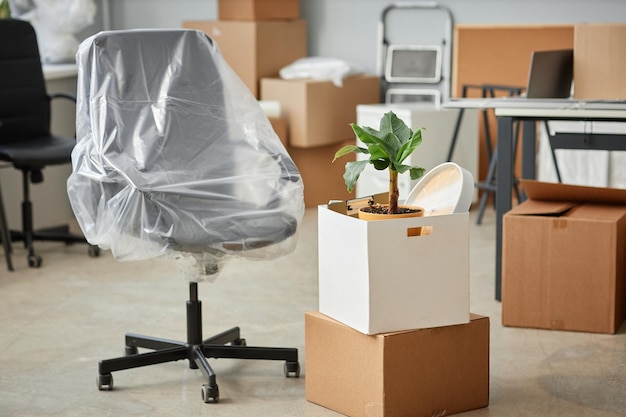 Packing furniture for moving in office