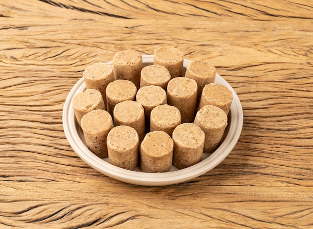 Pacoca typical brazilian peanut candy and june festival food over wooden table