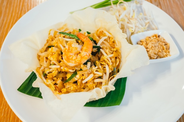 Pad thai noodles with shrimp or prawn on top