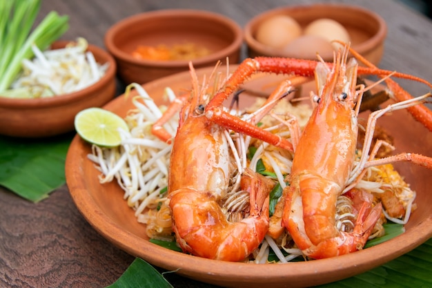 Pad Thai or Thai Style Stir-fried Noodle Topped with Whole Prawn