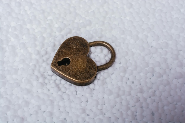 Photo padlock in heart shape as symbol of love