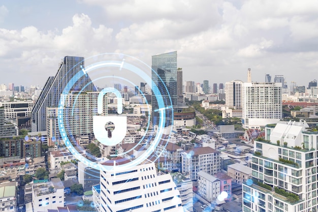 Padlock icon hologram over panorama city view of Bangkok to protect business in Southeast Asia The concept of information security shields Double exposure