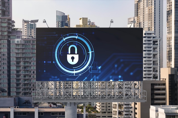 Padlock icon hologram on road billboard over panorama city view of Bangkok at day time to protect business Southeast Asia The concept of information security shields