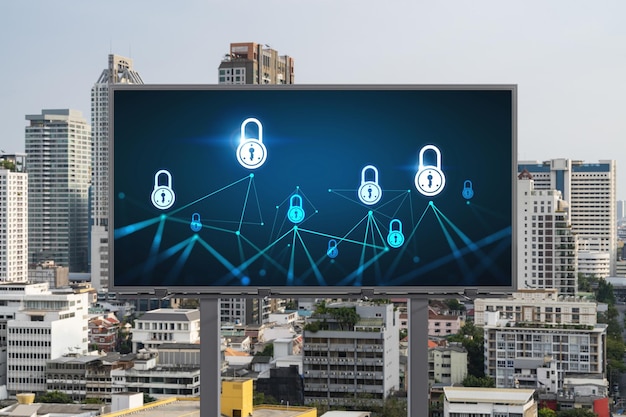 Padlock icon hologram on road billboard over panorama city view of Bangkok at day time to protect business Southeast Asia The concept of information security shields