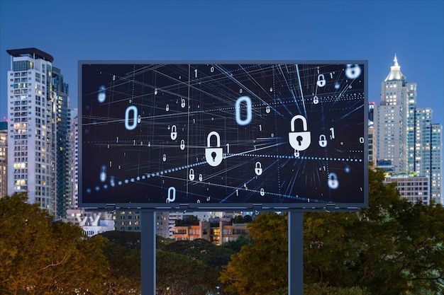 Padlock icon hologram on road billboard over panorama city view of Bangkok at night to protect business Southeast Asia The concept of information security shields