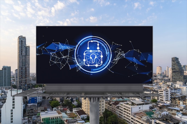 Padlock icon hologram on road billboard over panorama city view of Bangkok at sunset to protect business Southeast Asia The concept of information security shields