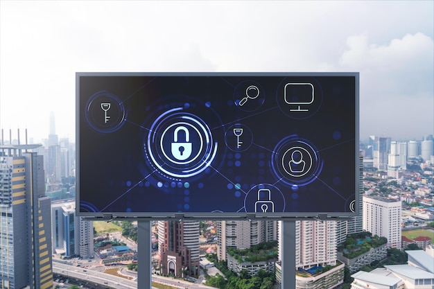 Padlock icon hologram on road billboard over panorama city view of Kuala Lumpur at day time to protect business Malaysia Asia The concept of information security shields