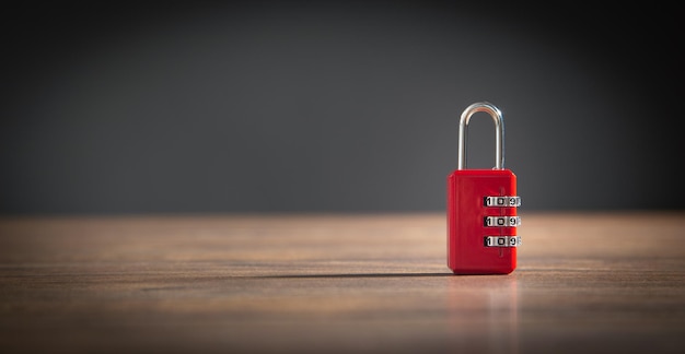 Padlock on the wooden table Security