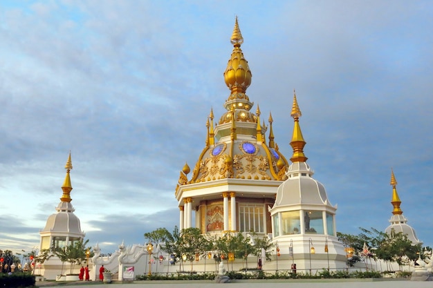 A pagoda decorated with white and gold color in Wat Thung Setthi, Khon Kaen, Thailand