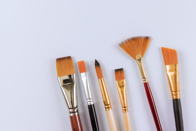 Paint artistic brushes on white isolated background