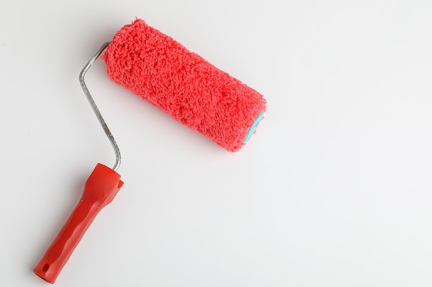 Photo paint roller brush isolated on white