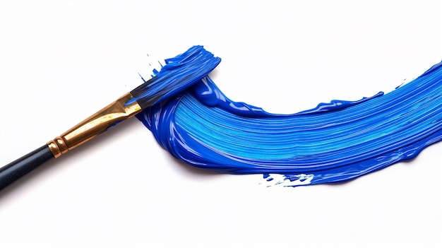 Paintbrush and blue paint on a white background closeup