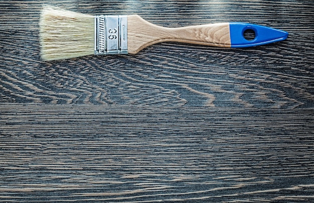 Paintbrush on wood board horizontal image