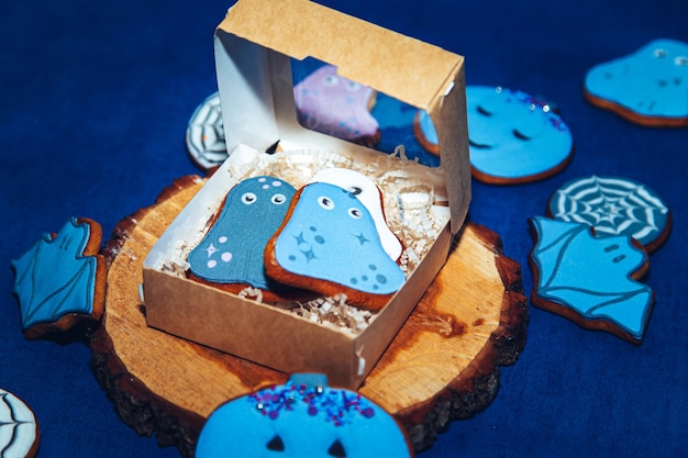 Painted gingerbread Halloween cookies on a blue background