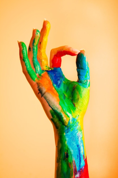 Photo painted hand with ok sign colorful fun