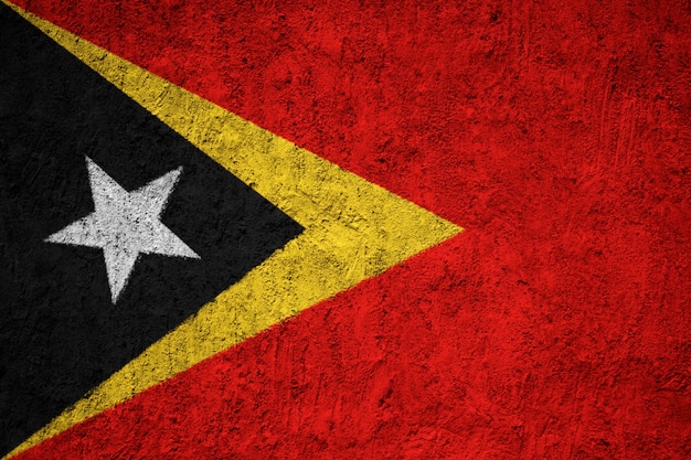 Painted national flag of East Timor on a concrete wall