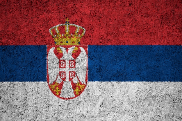 Painted national flag of Serbia on a concrete wall