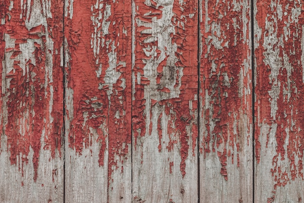 Painted old wooden red wall background. 