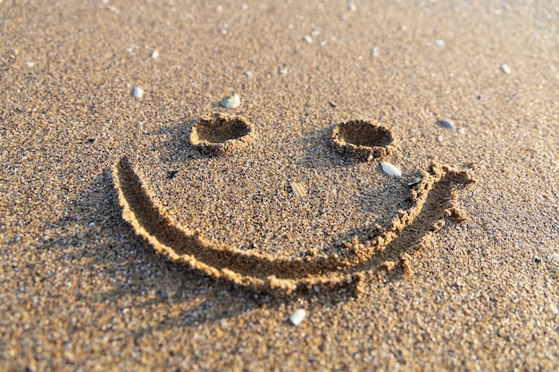 A painted smile in the sand.