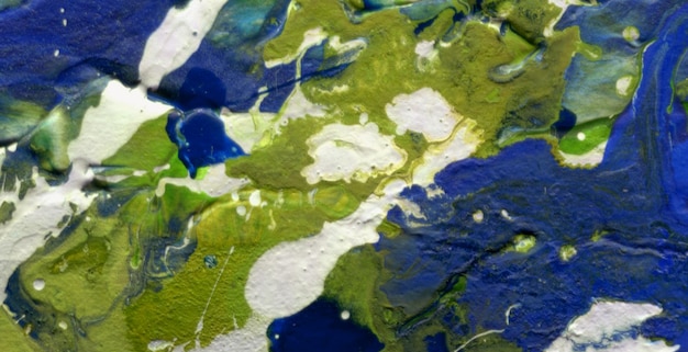 A painting of a blue and green landscape with white dots and green and blue paint.