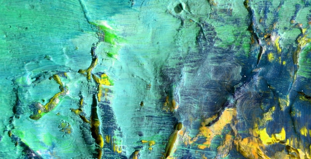 A painting of a mountain in green and blue