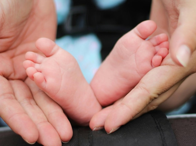 a pair of bare feet with one that has the other showing the toes