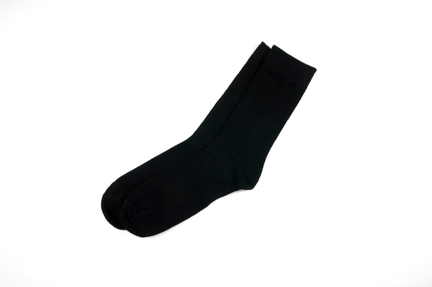 A pair of black socks on a white background isolated