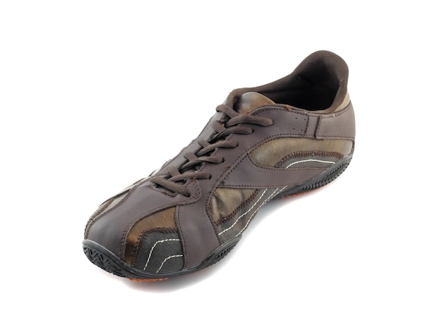 Pair of leather brown sneakers.  Isolated over white.