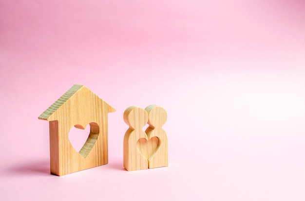 Pair of lovers stand near people at home