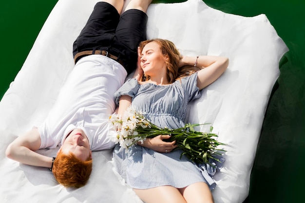 Pair the mattress with daisies  a date on the river  floating