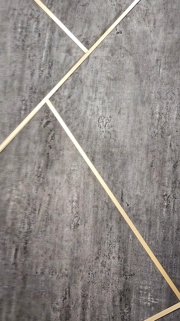 a pair of wooden sticks on a grey marble table.