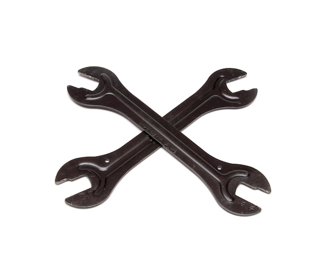 A pair of wrenches that say " x " on the bottom.