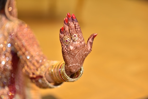 pakistani Indian brides hands showing rings and jewelry