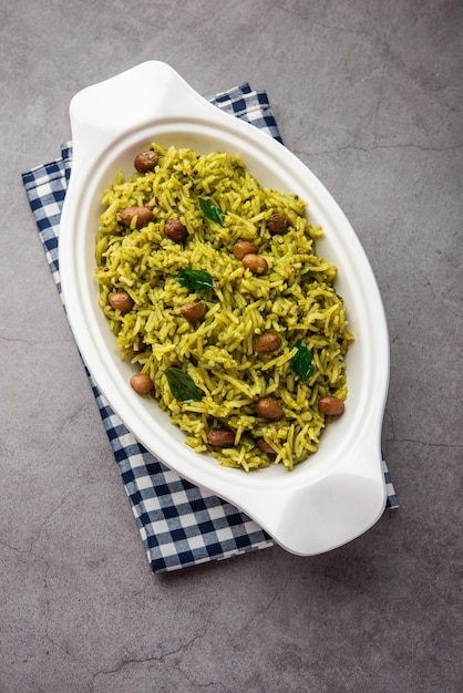 Palak khichdi is a one pot nutritious meal of mung lentils and rice with spinach Indian food