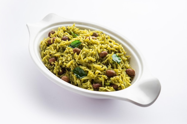 Palak khichdi is a one pot nutritious meal of mung lentils and rice with spinach Indian food