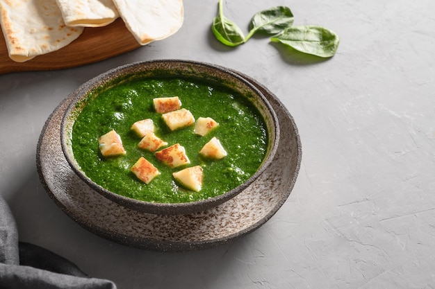 Palak paneer served with basmati rice indian vegetarian cuisine copy space