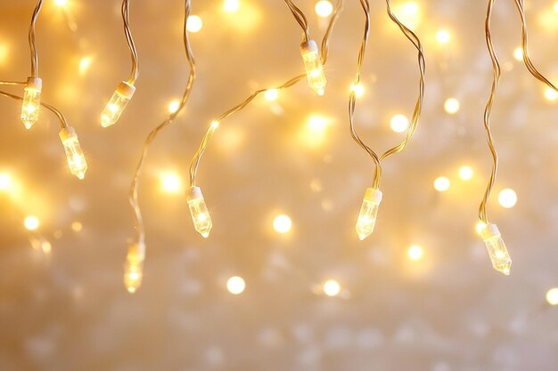 Photo pale yellow lights bokeh from christmas holiday garlands blurred festive abstract background lights