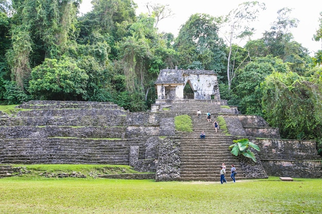 Palenque Mexico March 9th 2012 People explore ancient ruins of mayan settlement in Palenque Chiapas Mexico