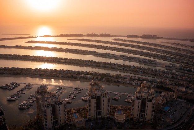 Palm Jumeirah island in Dubai on sunset modern architecture beaches and villas